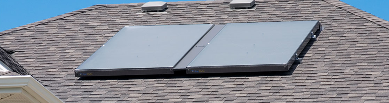 A picture of a solar hot water installation at a dairy farm